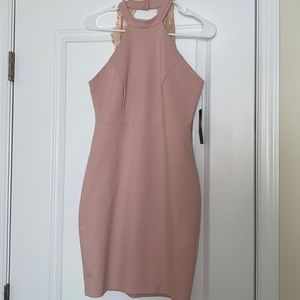 Lulu’s short fitted halter dress with a lacy piece on the back. Size L.